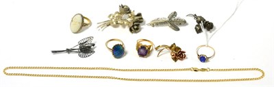 Lot 94 - Two opal rings, an amethyst ring, another ring, a flower brooch and four other brooches