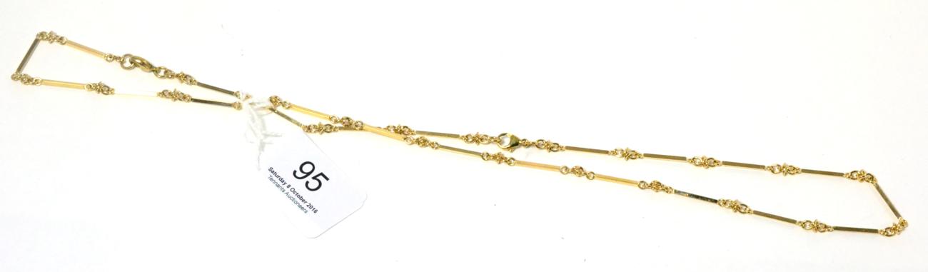 Lot 95 - A 9ct gold fancy link necklace and a matching bracelet (2)