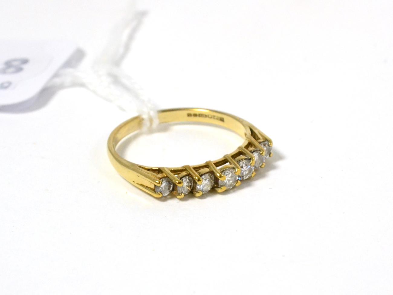 Lot 97 - A seven stone diamond ring