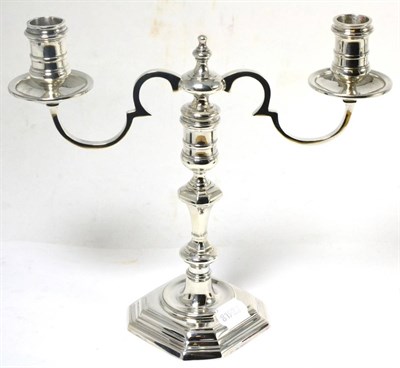 Lot 114 - A silver two branch candelabra