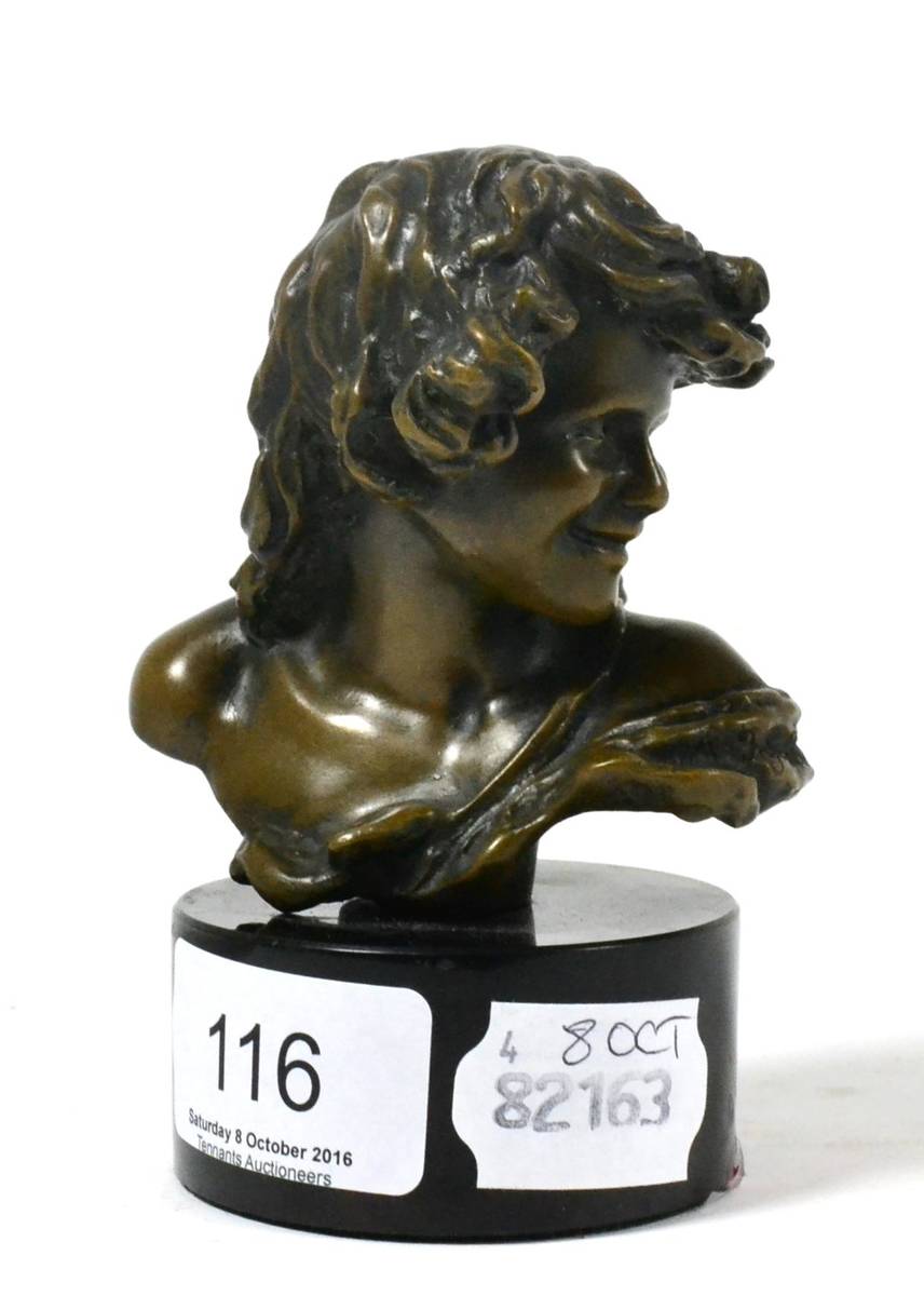 Lot 116 - A bronze bust of a boy, marble base