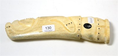 Lot 130 - North West territories whalebone carving of and Inuit hunter