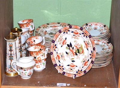 Lot 156 - A matched Imari tea service, together with two large decorative Continental serving plates