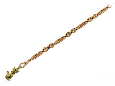 Lot 202 - A 9ct rose gold star and bar bracelet with stone set cat charm suspended