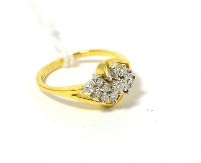 Lot 209 - An 18ct gold diamond cluster ring