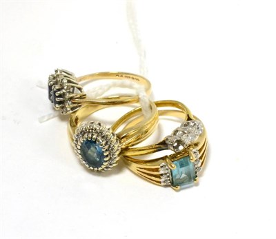 Lot 220 - Three 9ct gold dress rings and a dress ring stamped '18CT' (4)