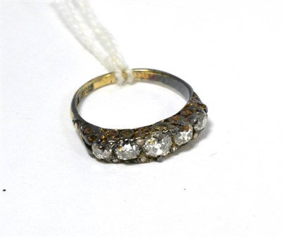 Lot 235 - A diamond five stone ring, setting worn, stamped '18CT'