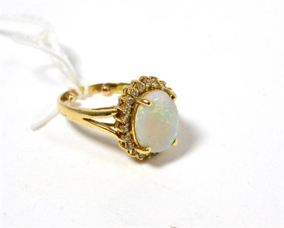 Lot 243 - Opal and diamond cluster ring