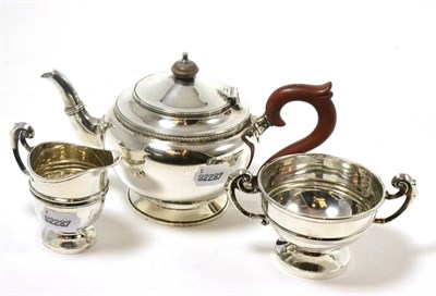 Lot 273 - A matched silver three piece tea service