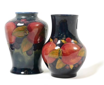 Lot 287 - Two William Moorcroft Pomegranate pattern vases, impressed factory marks and painted monograms,...