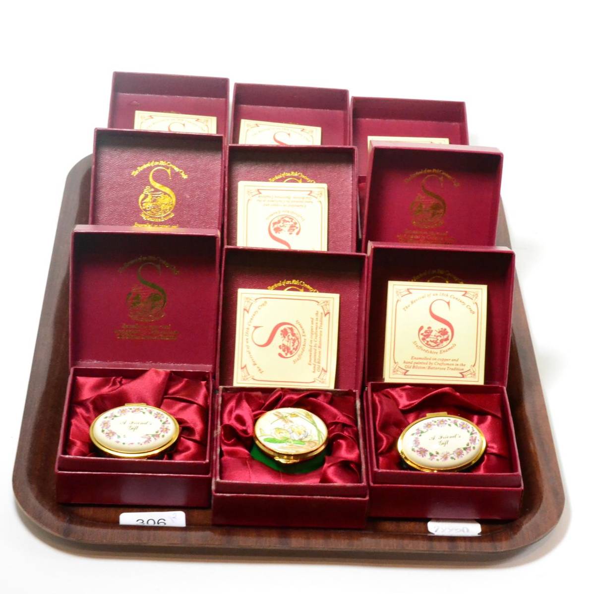 Lot 306 - A collection of seventeen Staffordshire enamel boxes (on two trays)