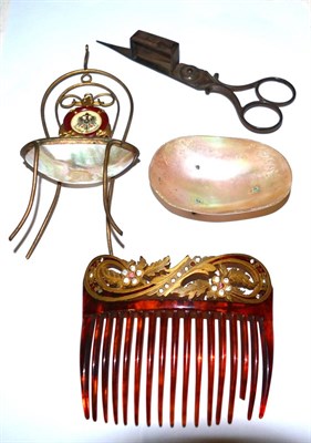Lot 317 - A mother-of-pearl and brass sweetmeat dish modelled as a chair, another similar, a hair comb...