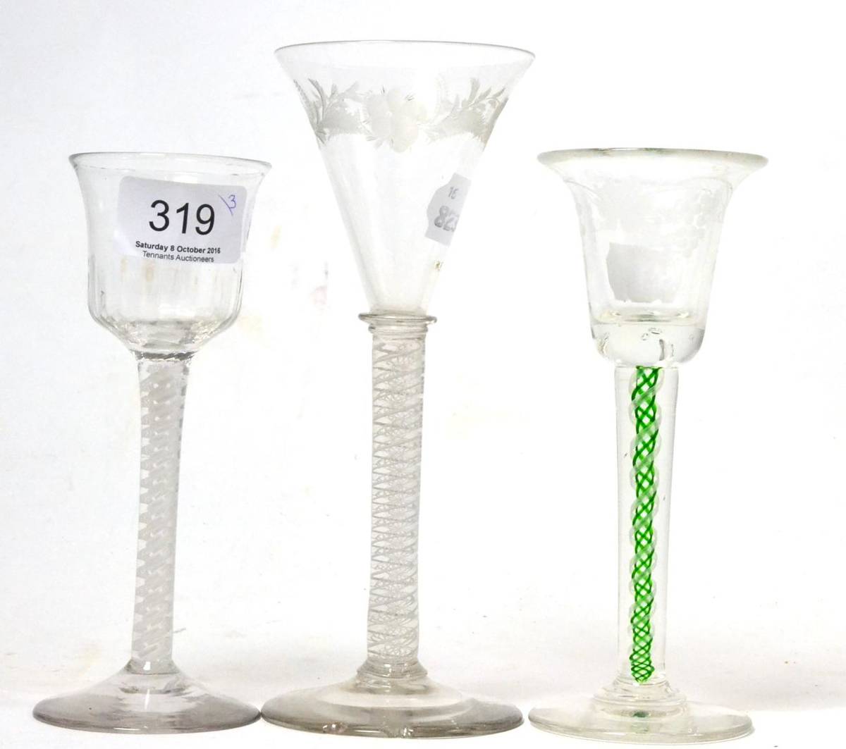 Lot 319 - Three various George III wine glasses, each with spiral cotton twist stems (a.f.)
