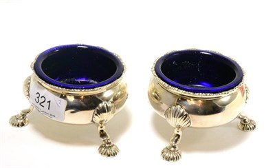 Lot 321 - A pair of George III silver salts, David Hennell I, London 1762, with blue glass liners