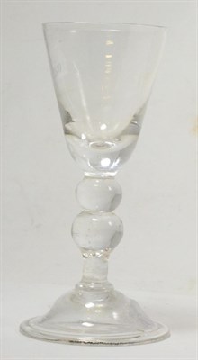 Lot 336 - A Georgian baluster stem wine glass