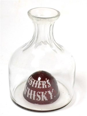 Lot 338 - An early 20th century Ushers Whisky enamelled glass advertising water carafe