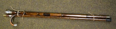 Lot 353 - An 18ct gold mounted bamboo walking cane, a silver mounted partridge wood cane and a flask...