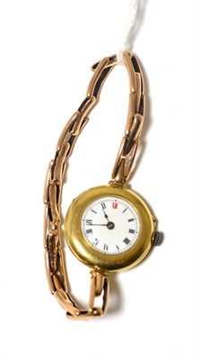 Lot 380 - An 18ct gold lady's watch, on expanding bracelet