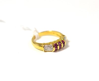 Lot 387 - A ruby and diamond ring stamped '750'