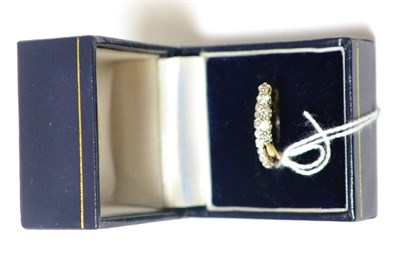 Lot 400 - A 9ct gold diamond five stone ring and a diamond set band ring, stamped 'PLAT' (2)