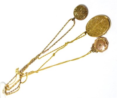 Lot 412 - A 9ct gold locket on chain and two lockets on chains (qty)