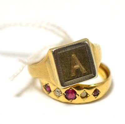 Lot 427 - A 9 ct gold signet ring, a 22ct gold band ring and a ruby and diamond ring (one setting vacant) (3)