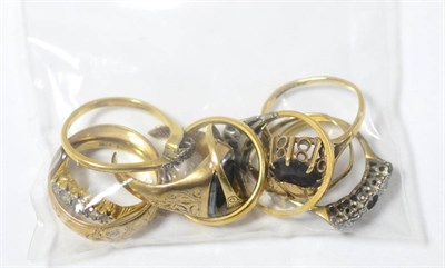 Lot 437 - A collection of ten gold and yellow metal rings, some inset with stones, various designs and carats