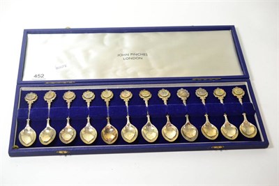 Lot 452 - A set of twelve silver zodiac spoons