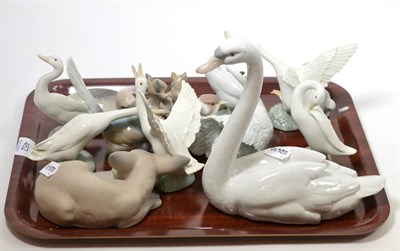Lot 462 - A collection of Lladro figures including birds and animals and two Keswick pewter dishes