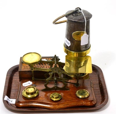 Lot 474 - A Patterson mining lamp; a pair of postal scales with weights; a pocket sovereign scales and a...