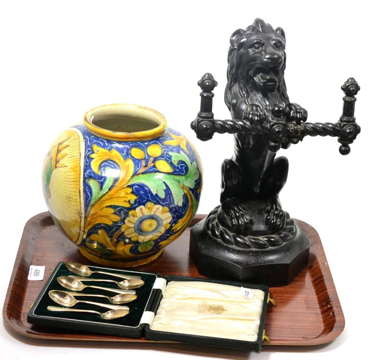 Lot 486 - Majolica drug jar, cast iron lion and set six silver spoons