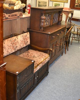 Lot 1078 - A 1920's oak telephone bench, together with an oak court cupboard of similar date and a drop...