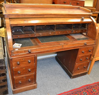 Lot 1090 - A Victorian mahogany roll top desk