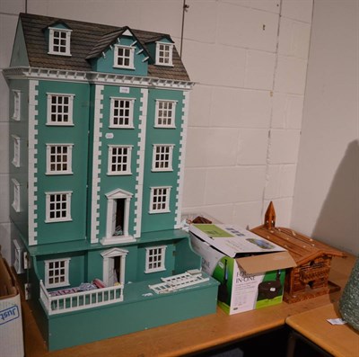 Lot 1108 - A large Georgian style dolls house, a quantity of dolls house furniture and accessories and an...