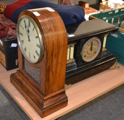 Lot 1116 - A walnut mantel clock and an ebonised clock 92)