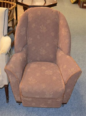 Lot 1157 - A 1930's upholstered rocking chair