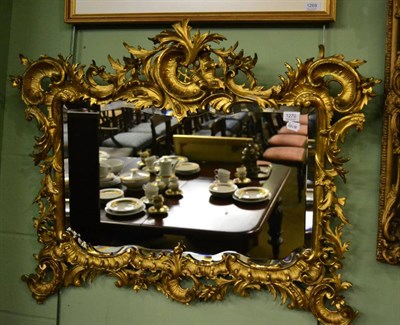 Lot 1270 - A gilt framed Rococo style mirror