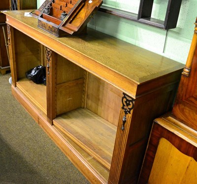 Lot 1275 - An oak low open bookcase