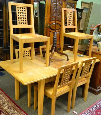 Lot 1297 - An Old Mill oak extending dining table, by the Knight family, the moulded rectangular top raised on