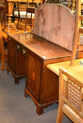 Lot 1299 - A Georgian style mahogany sideboard