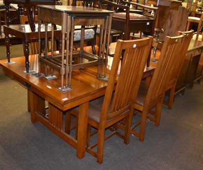 Lot 1302 - Modern oak extending dining table together with six matching chairs