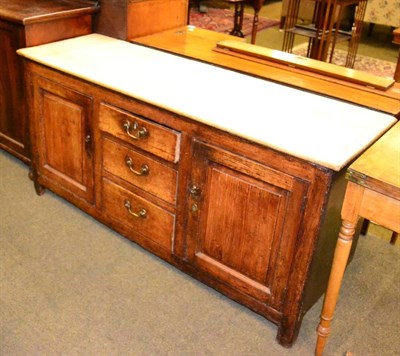 Lot 1325 - A Georgian pine and oak dresser base