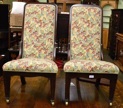 Lot 1329 - A pair of mahogany framed nursing chairs