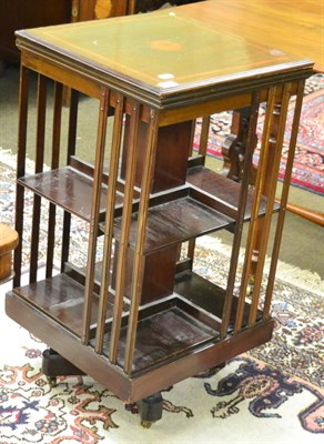 Lot 1334 - A mahogany revolving bookcase