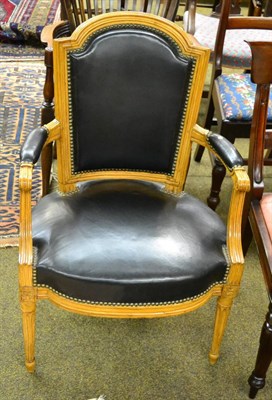 Lot 1356 - A Louis XVI style open armchair