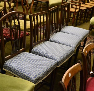 Lot 1363 - Set of three George III oak dining chairs together with another 19th century chair (4)