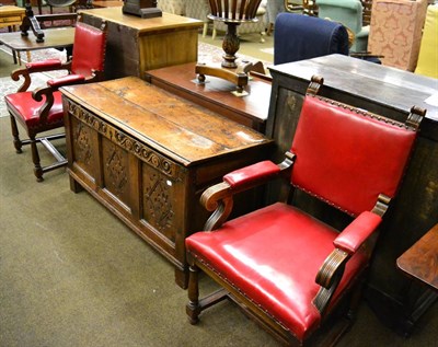 Lot 1381 - A pair of oak framed armchairs