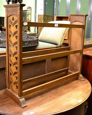 Lot 1393 - An Arts & Crafts inlaid oak towel rail