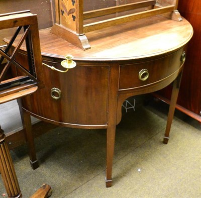 Lot 1394 - A mahogany bow fronted sideboard