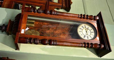 Lot 1407 - A walnut veneered Vienna type striking wall clock, with double weight driven movement, together...